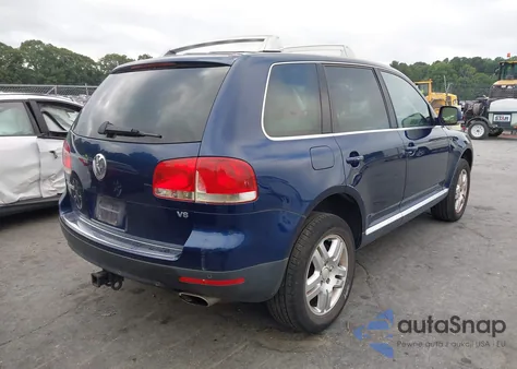 2004 Volkswagen Touareg V8 z USA, uszkodzony, nr VIN WVGCM77L64D057212